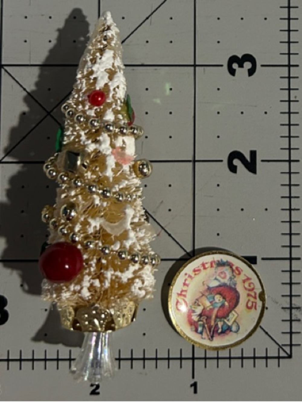 Miniature White Christmas Tree and “Christmas 1975” Santa Plate